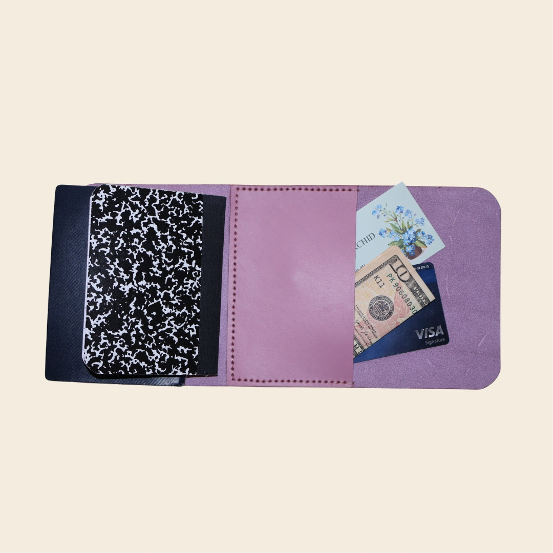 Purple journal with pocket on a beige background