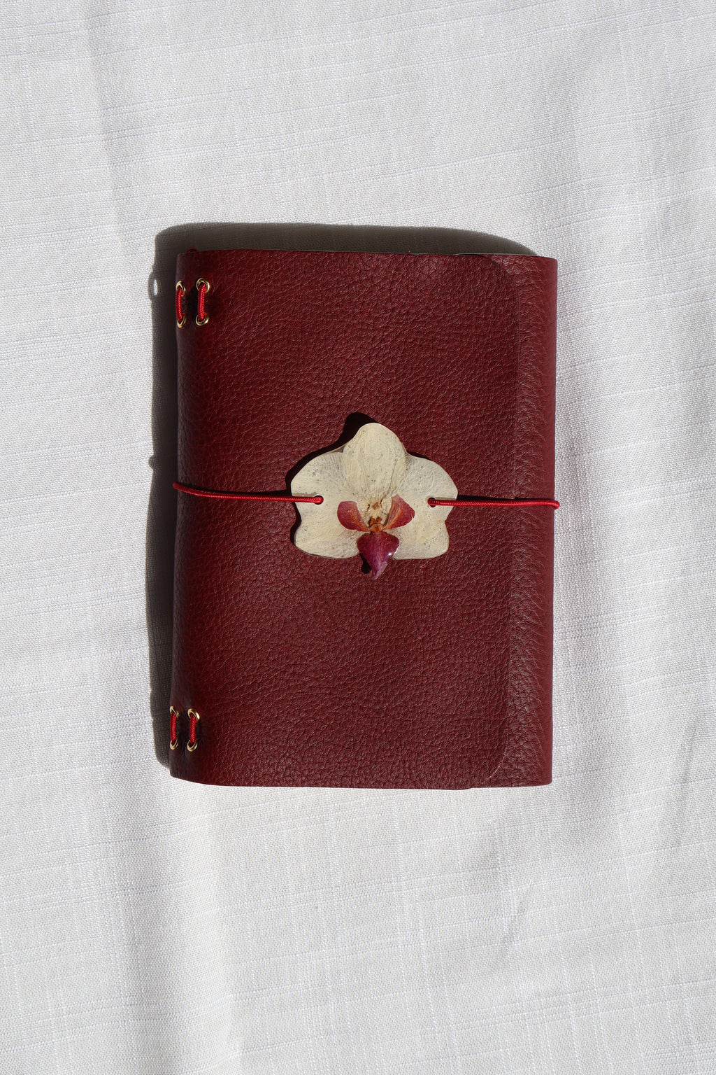 Mini White Orchid with Burgundy Center Charm